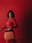 Woman in front of a red background